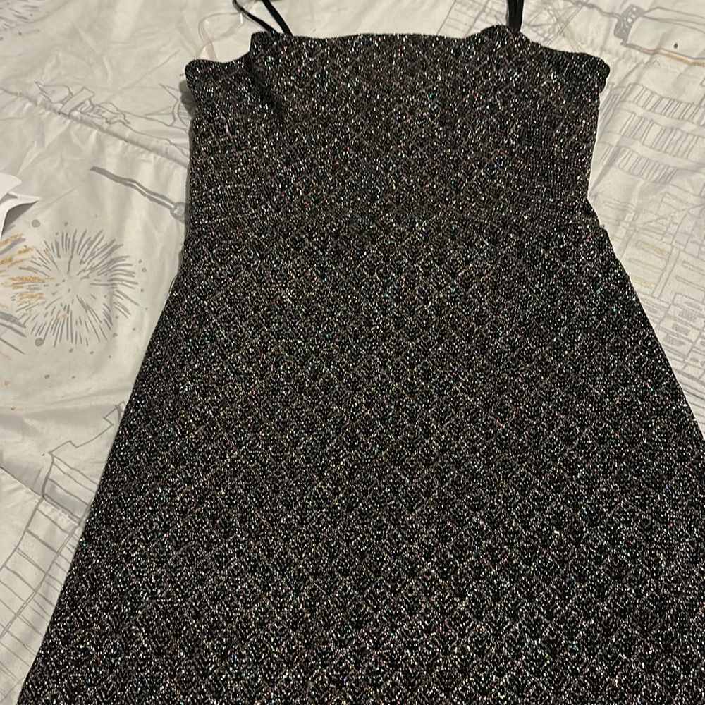 Beautiful black dress  never wear it it just been on my clothes for 1 years now